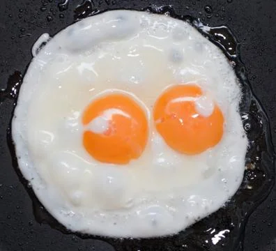 Fried egg Stock Photos
