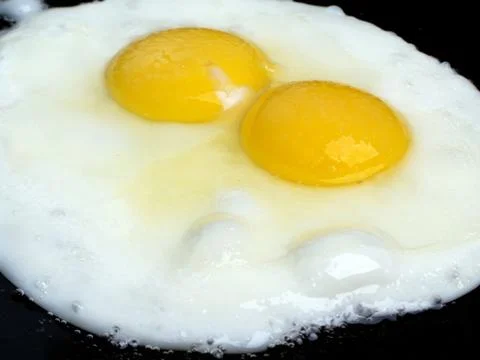 Fried egg Stock Photos