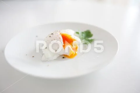 Fried egg poache pan meal recipe healthy food concept Stock Photos