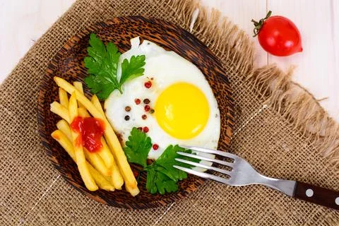 Fried Egg with Potato Stock Photos