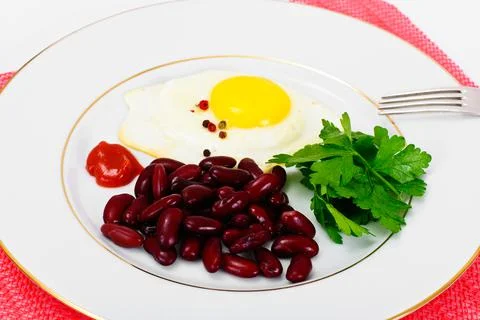 Fried Egg with Red Beans Stock Photos
