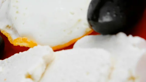 Fried egg on red dish 스톡 동영상 38760696