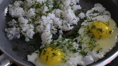 Fried egg with rice Stock Footage 78190793