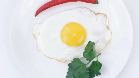 Fried Egg Rotating Stock Footage 85611041
