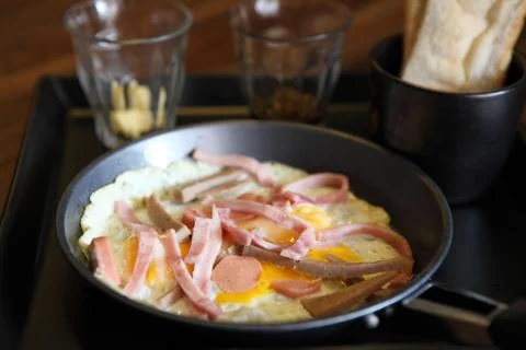 Fried egg stuff with hot pan Stock Photos