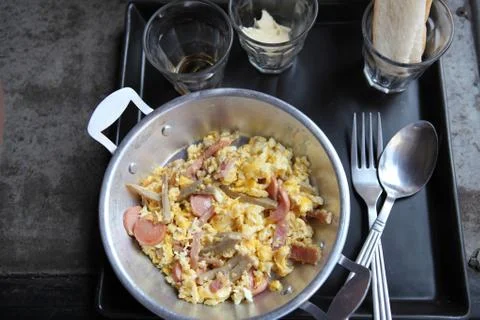 Fried egg stuff with hot pan Stock Photos