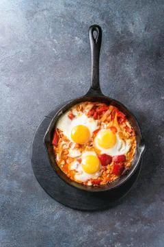 Fried egg with vegetables Stock Photos