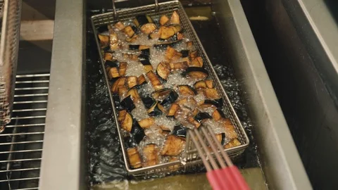 Fried eggplant in the kitchen in a restaurant Stock Footage 89065441
