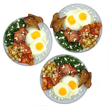 Fried eggs and bacon Stock Photos