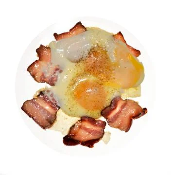 Fried eggs and ham Stock Photos