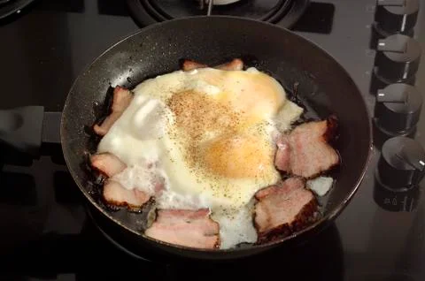 Fried eggs and ham Foto stock