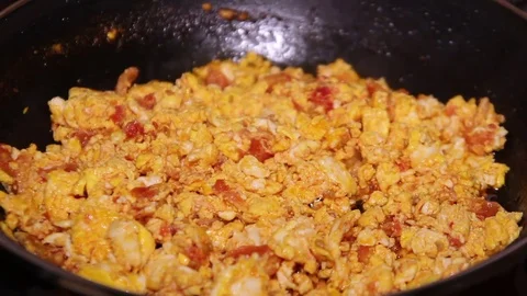 Fried Eggs And Tomatoes Close Up Stock Footage 79496203