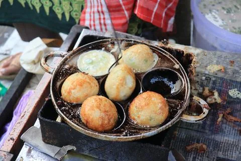 Fried eggs are usually called (SD snacks in Indonesia) which have been shap.. Stock Photos