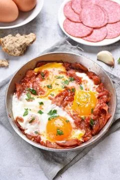 Fried eggs with bacon Stock Photos