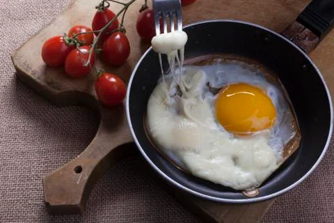 Fried eggs for breakfast Stock Photos