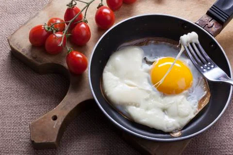 Fried eggs for breakfast Stock Photos
