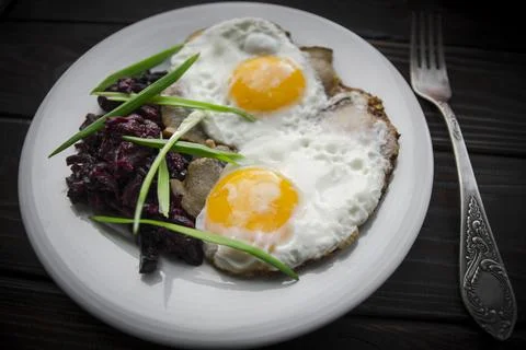 Fried eggs for breakfast in salo Stock Photos