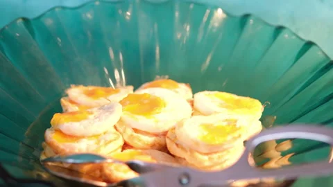 Fried eggs buffet lots of small fried quail eggs in plastic containers sell buy Video stock 310156318