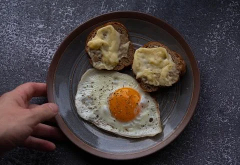 Fried eggs with cheese Stock Photos