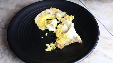 Fried eggs that fail Stock Photos