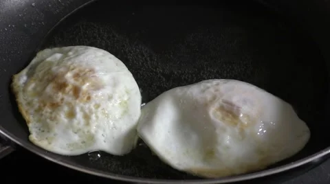 Fried eggs Stock Footage 46688386