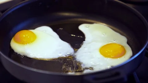 Fried eggs Stock Footage