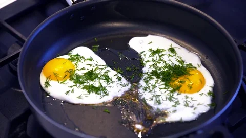 Fried eggs Stock Footage 73750806