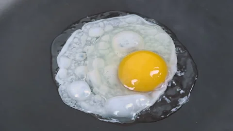 Fried eggs Stock Footage 159010220