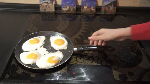 Fried eggs of four eggs. Hot fried eggs. Breakfast. Fried eggs ready Stock Footage 128227128