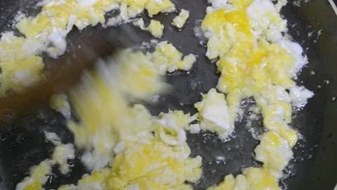 Fried eggs fried in a skillet Stock Footage 75166658