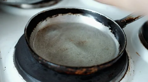 Fried eggs in a frying pan Stock Footage 64164929