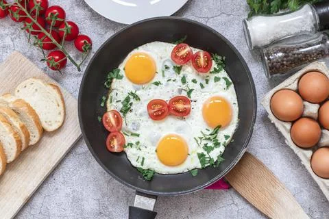 Fried eggs in a frying pan. Fotos Stock