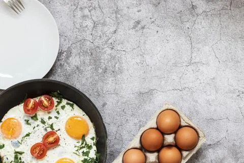 Fried eggs in a frying pan. Fotos Stock