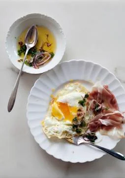 Fried eggs with ham Stock Photos