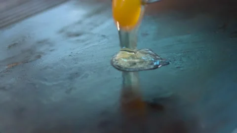 Fried eggs in a hot pan Stock Footage 134466771