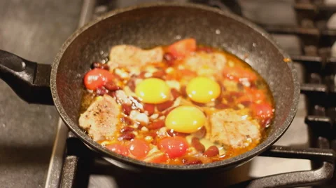 Fried eggs with meat time lapse Stock Footage 62160977