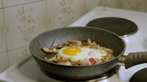 Fried eggs in a pan Stock Footage 240914311