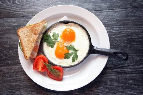 Fried Eggs On Pan Stock Photos