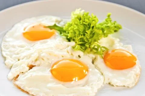 Fried eggs Stock Photos
