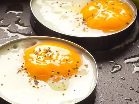 Fried eggs Stock Photos