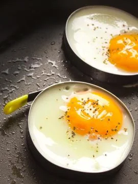Fried eggs Stock Photos