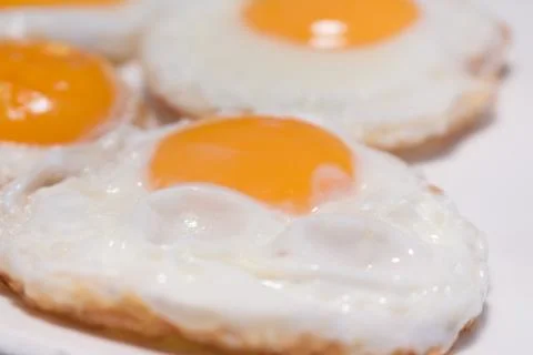 Fried eggs Stock Photos
