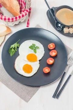 Fried eggs Stock Photos