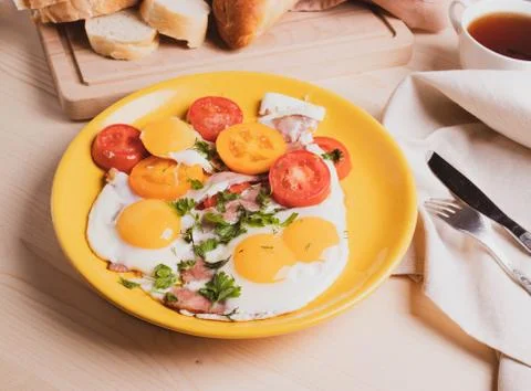 Fried eggs Stock Photos
