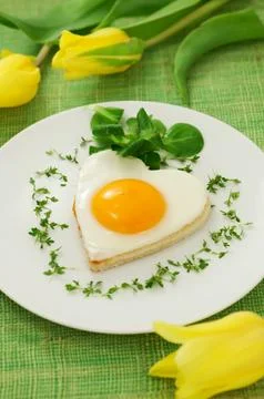 Fried eggs Stock Photos