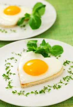 Fried eggs Stock Photos
