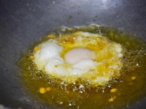 Fried eggs Stock Photos