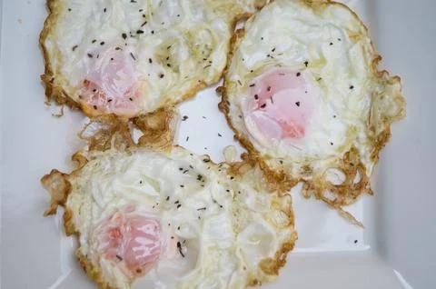 Fried eggs Stock Photos