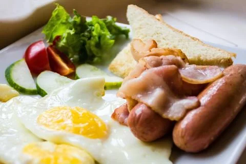 Fried eggs on a plate. Stock Photos