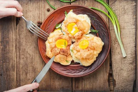 Fried eggs in a plate Stock Photos